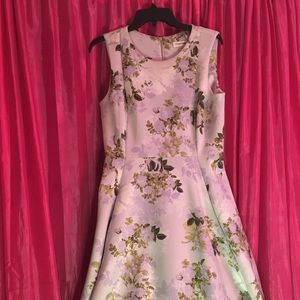 Beautiful floral midi dress. Worn less than a handful of times.